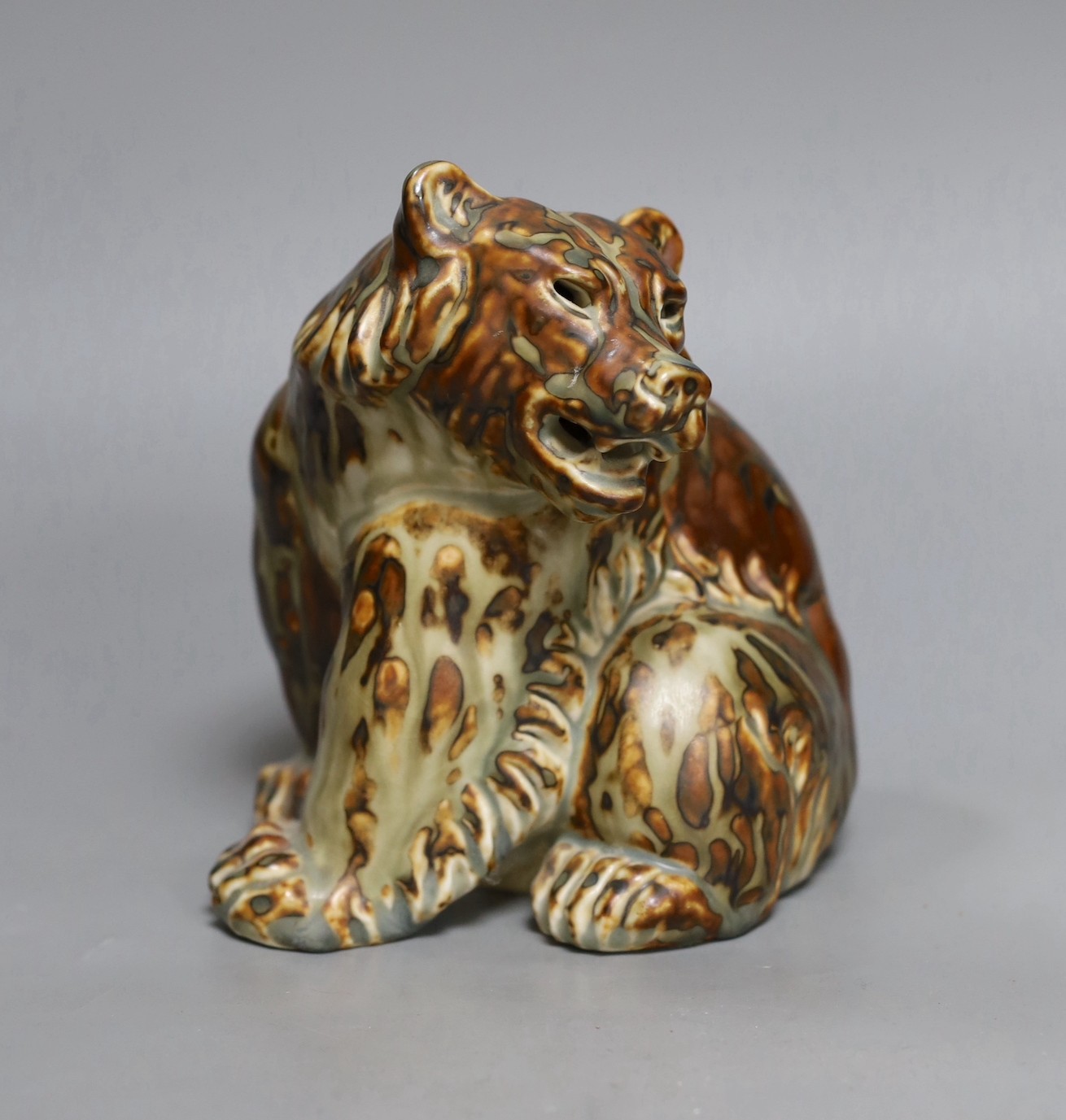 A Royal Copenhagen stoneware model of a bear, marked, M 20208, 17.5cms high